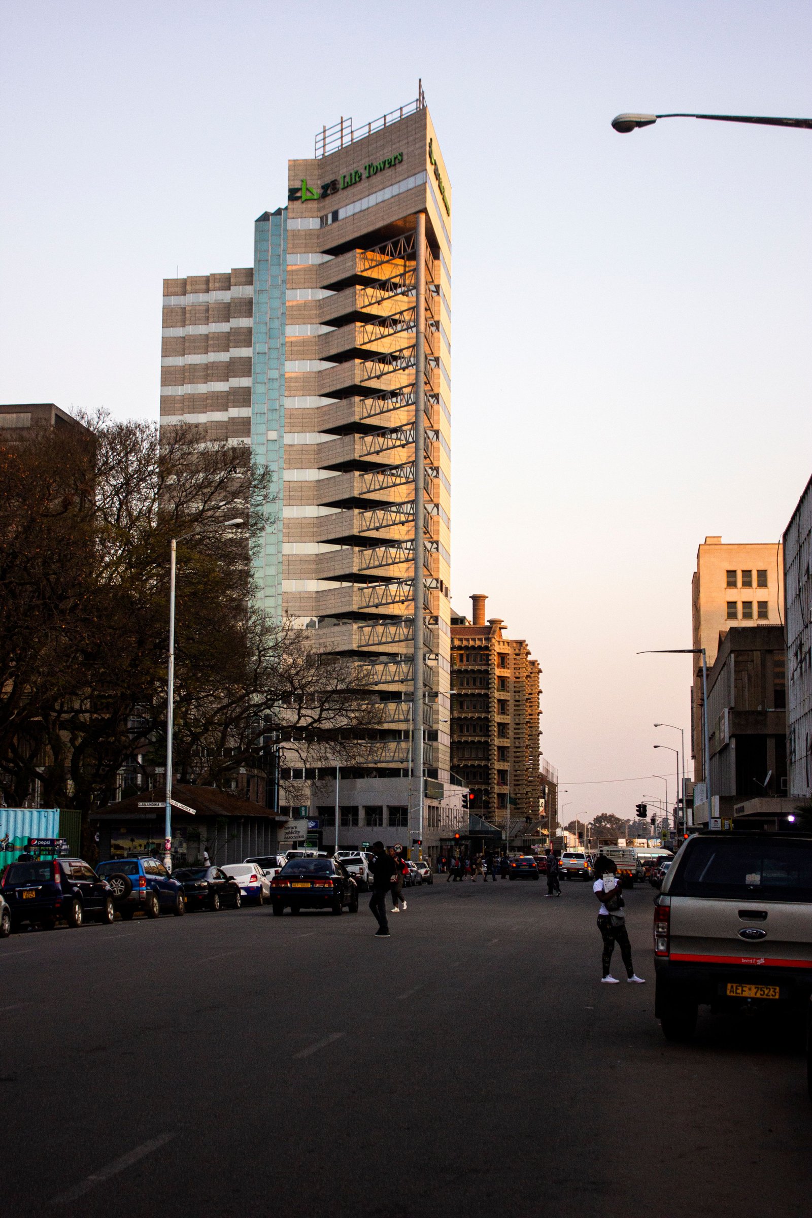 A stately high-rise in the capital city at golden hour